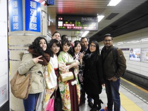 ZEF students stopping locals with traditional clothes for a picture